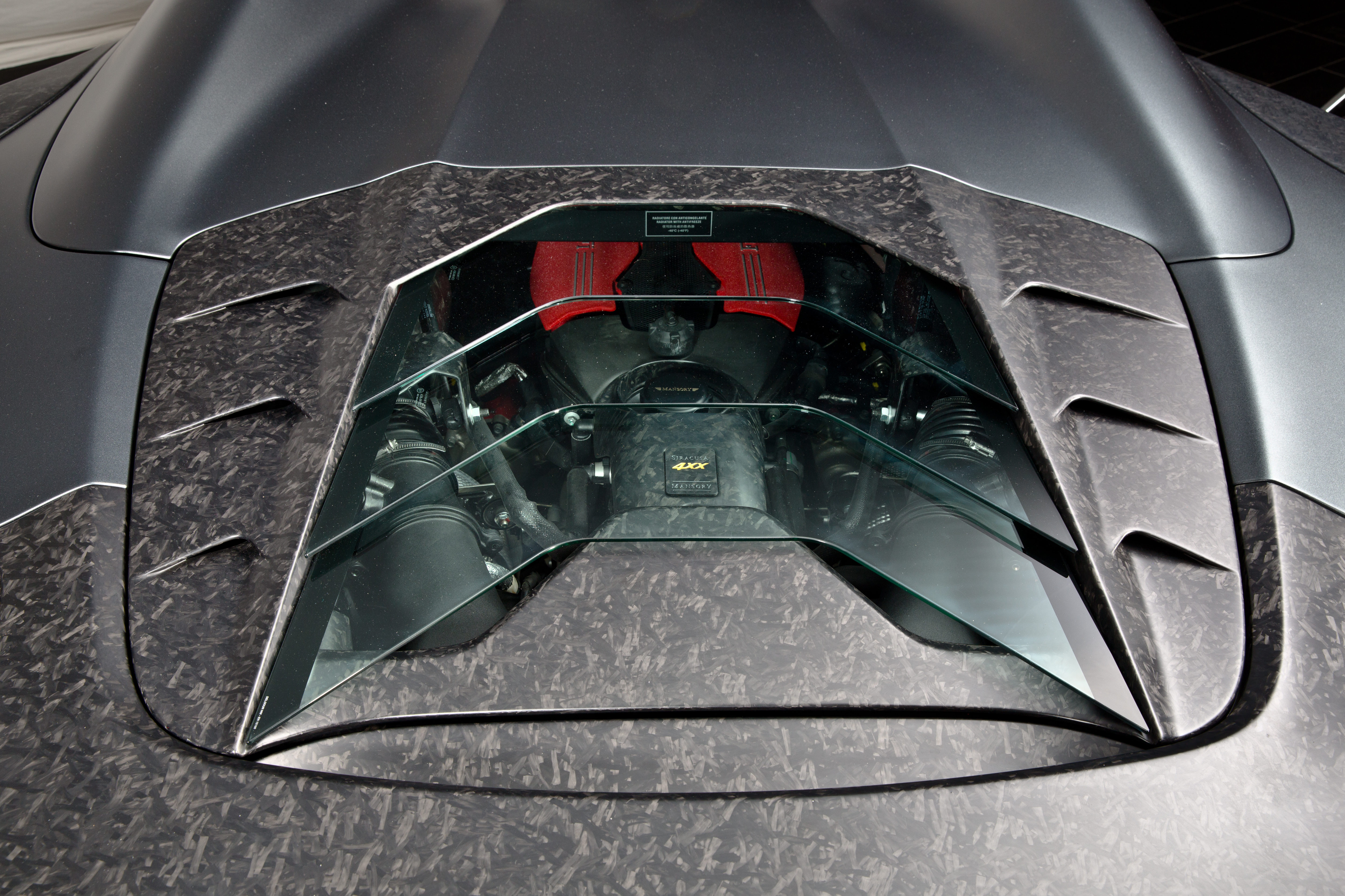 mansory_ferrari_488_siracusa_spider_07.jpg